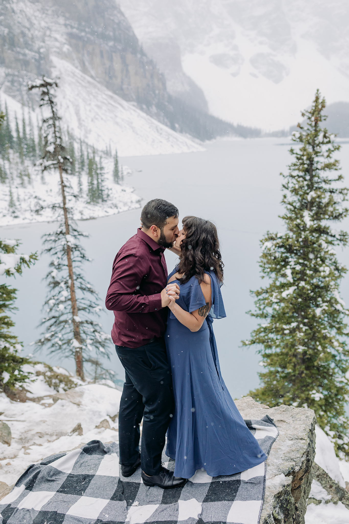 Rocky Mountain Engagement photography with fresh snow in Banff National Park