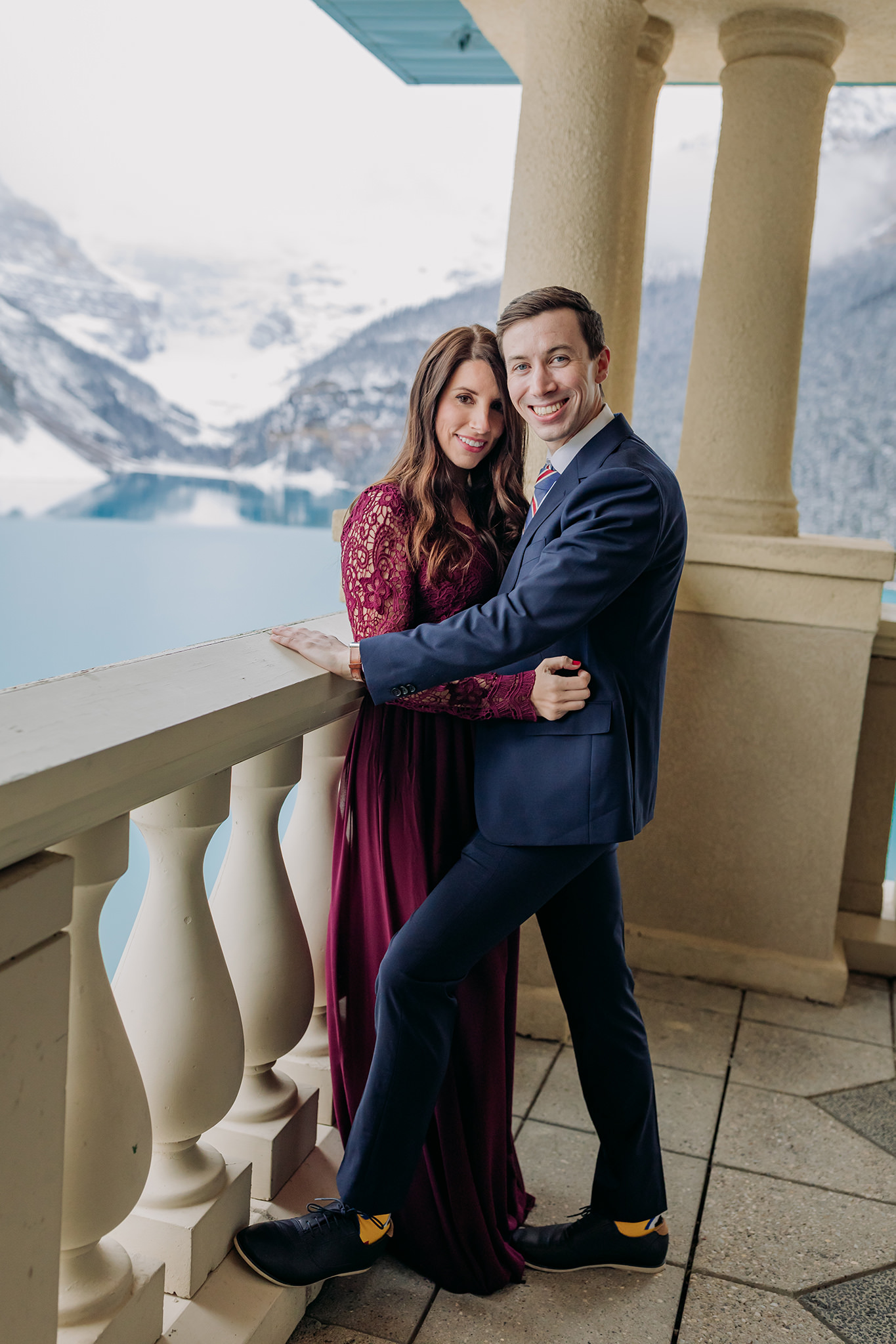 Lake Louise in October Magical SNowy formal mountain engagement photography session in the Belvedere Suite at Fairmont Chateau Lake Louise