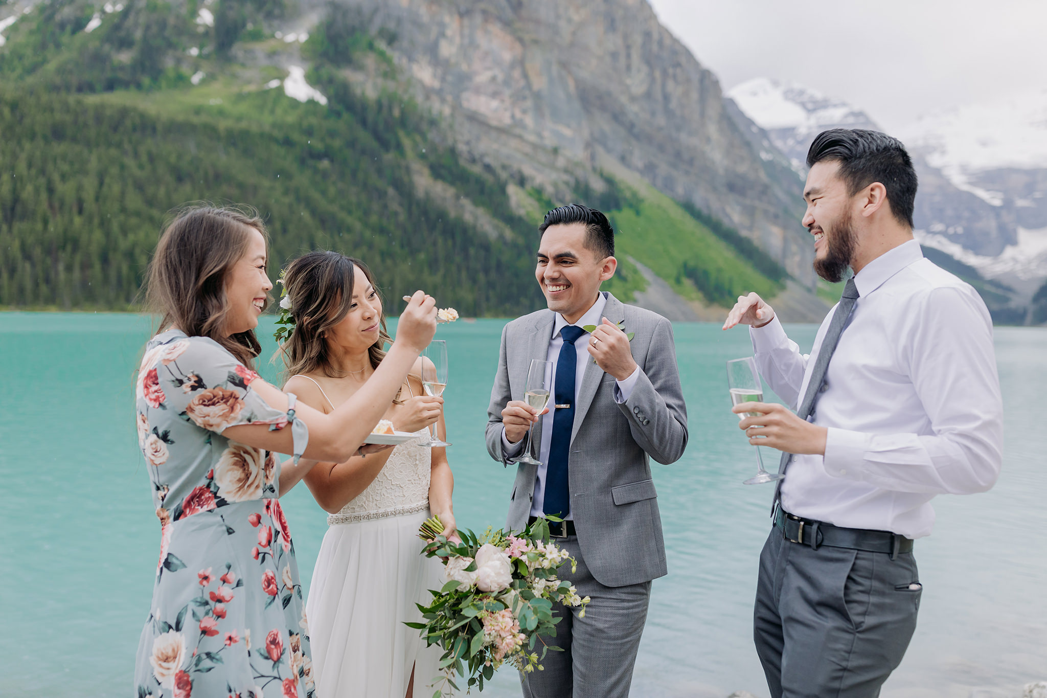 How to Get Married in 2020: Elope Now & Party Later! Lake Louise m eating cake drinking champagneountain elopement