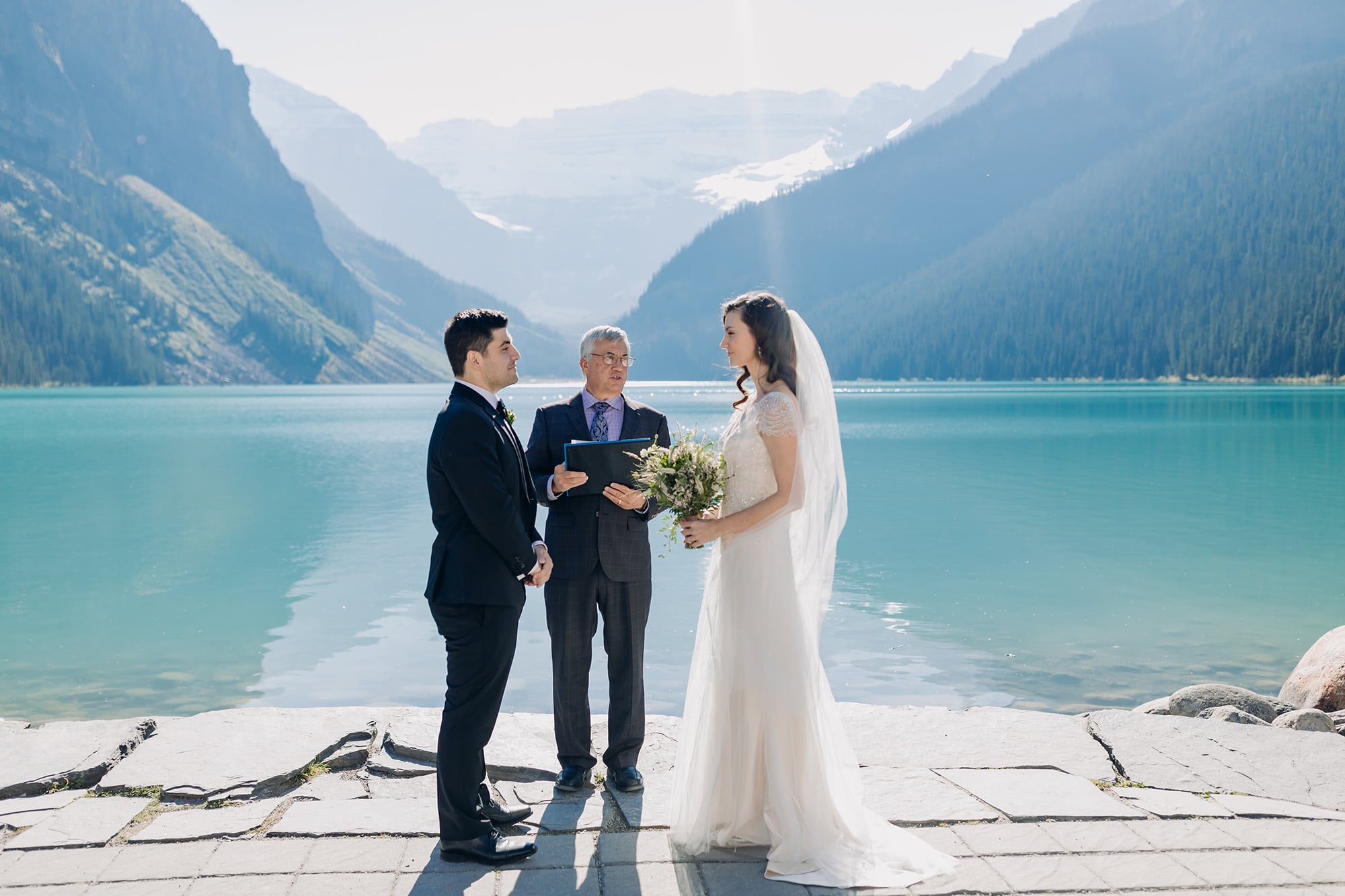 lake side wedding ceremony at Lake Louise in September