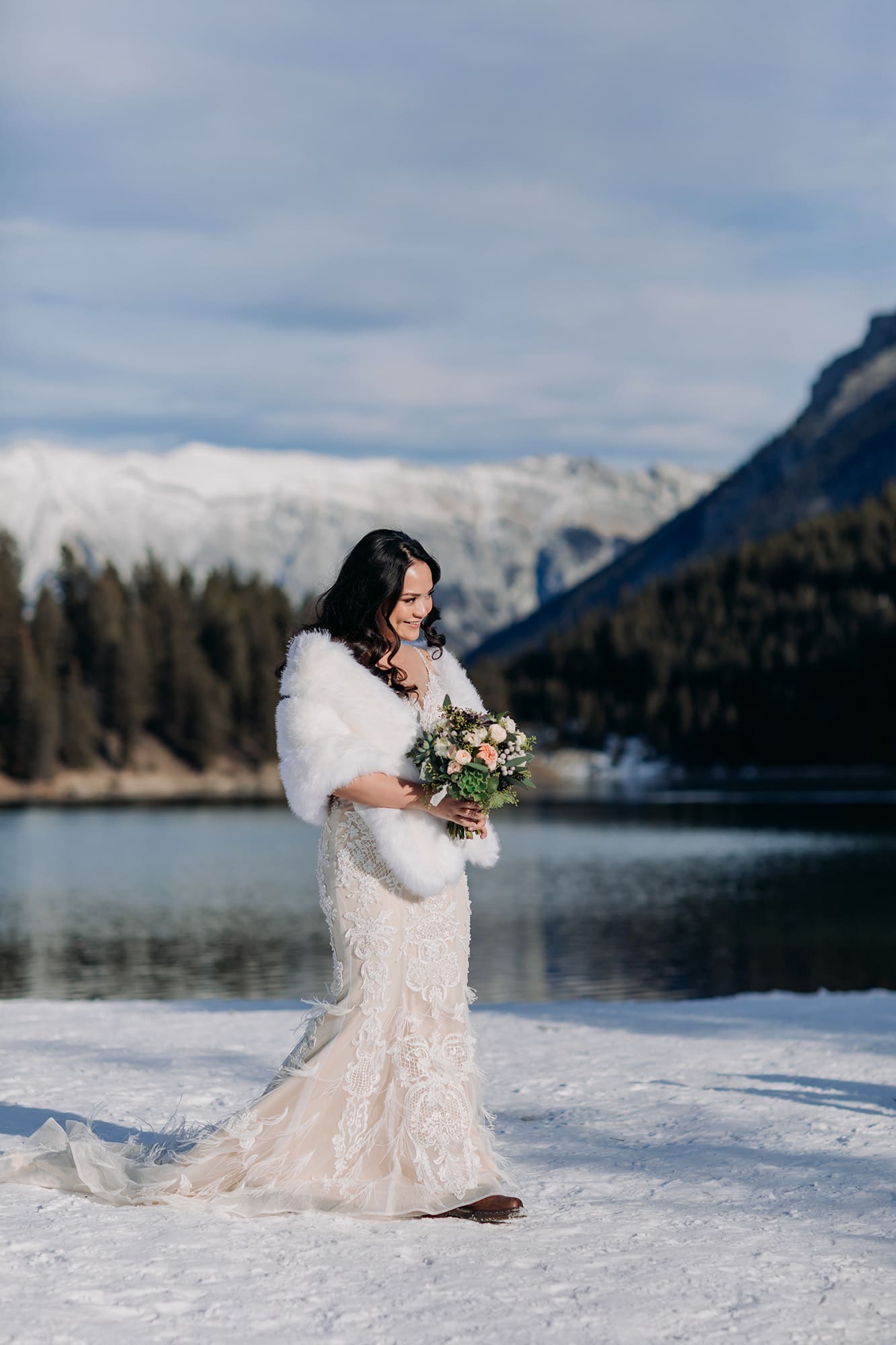 bride walking to outdoor ceremony at Two-Jack Lake