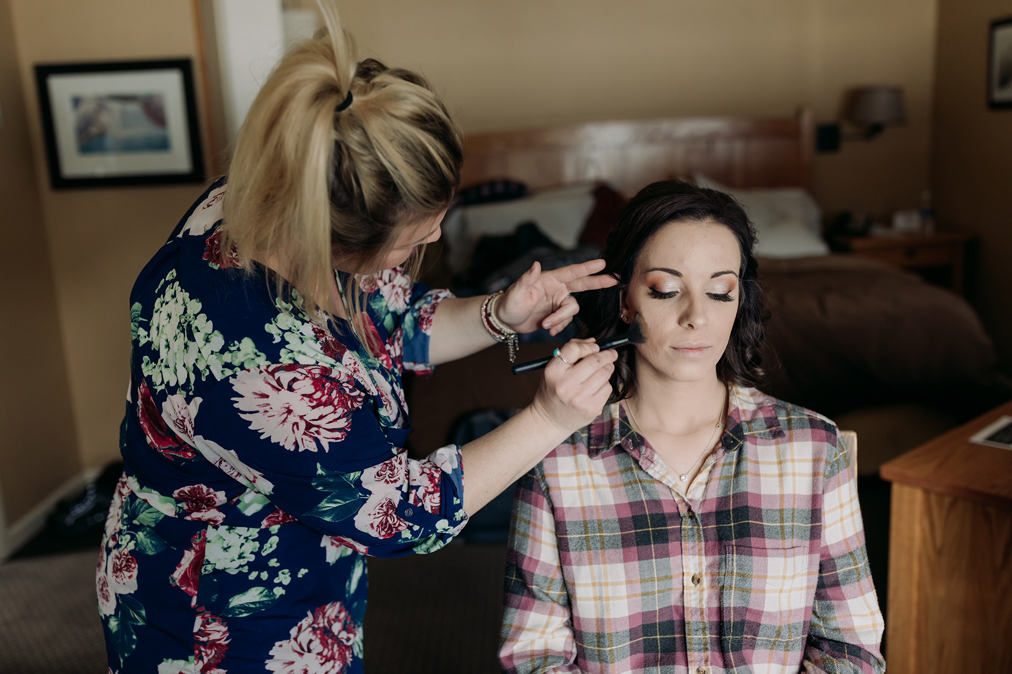 Emerald Lake Lodge elopement bride getting ready in cabin hair & make-up