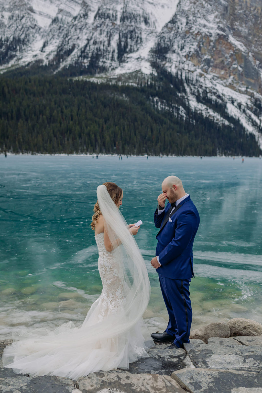 Epic Blue Ice winter wedding at Fairmont Chateau Lake Louise mountains