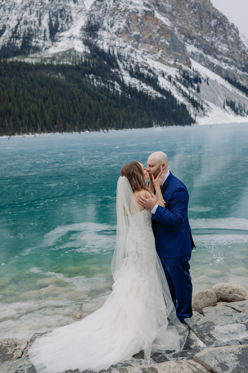 Epic Blue Ice winter wedding at Fairmont Chateau Lake Louise mountains