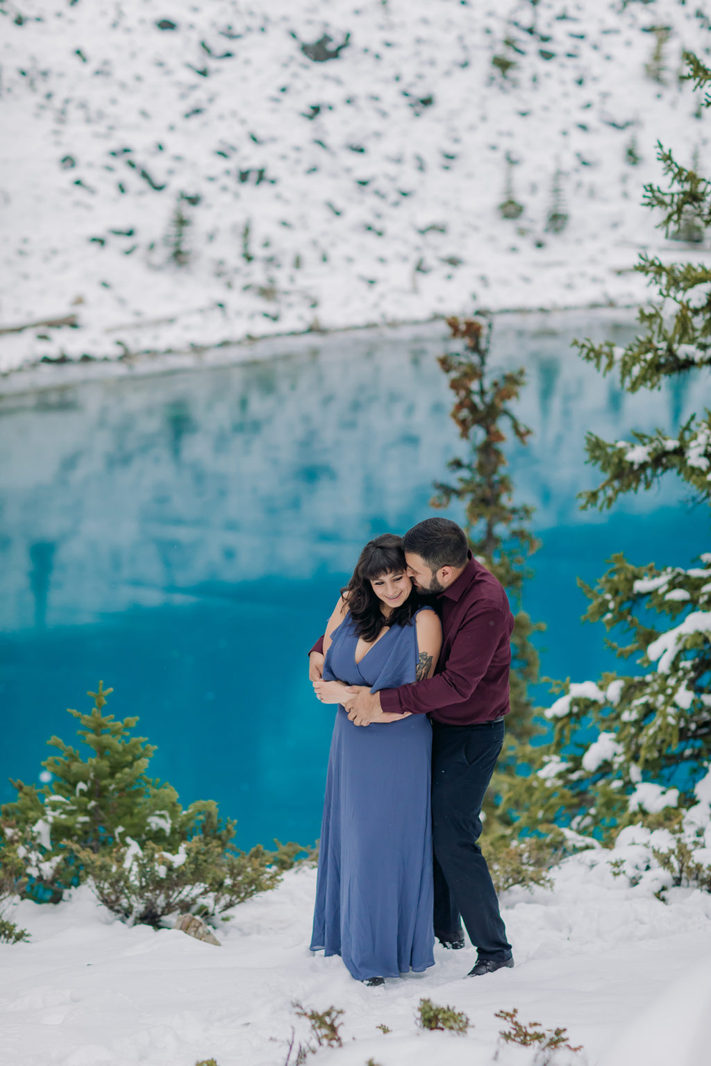 Moraine Lake in October: Engagement Photography with blue ice & snow