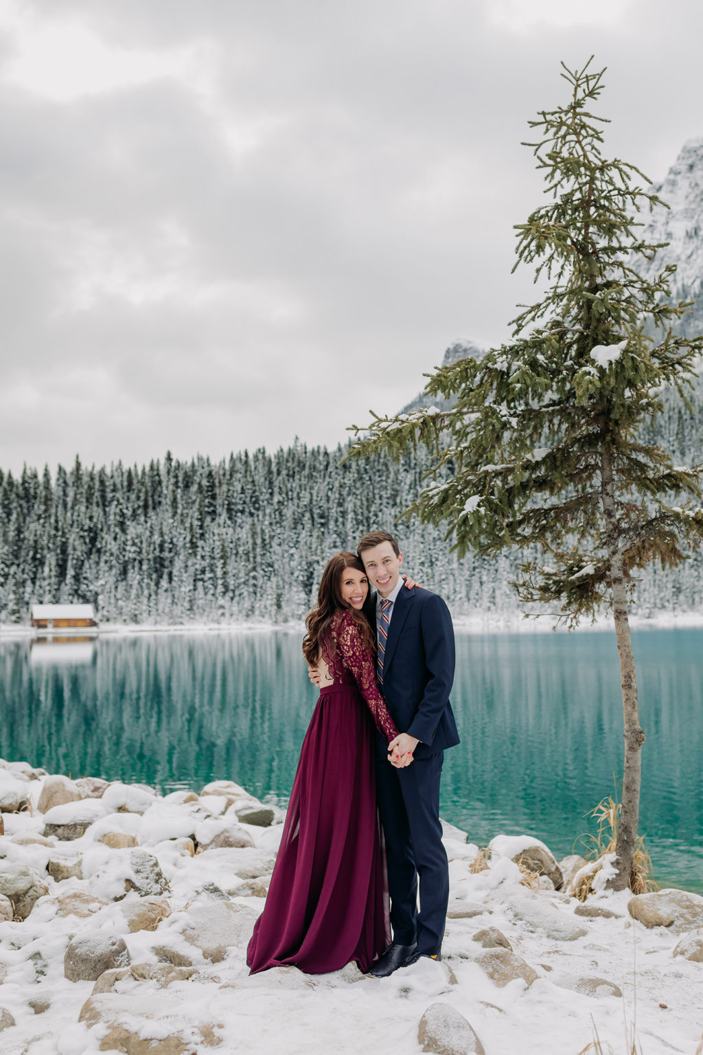 Lake Louise in October: Magical Snowy Mountain Engagement Photos