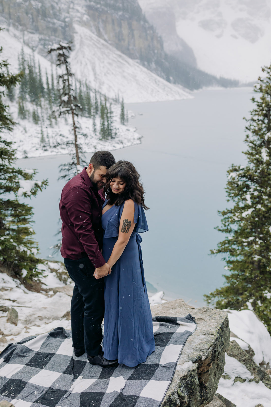 Moraine Lake in October: Engagement Photography with blue ice & snow