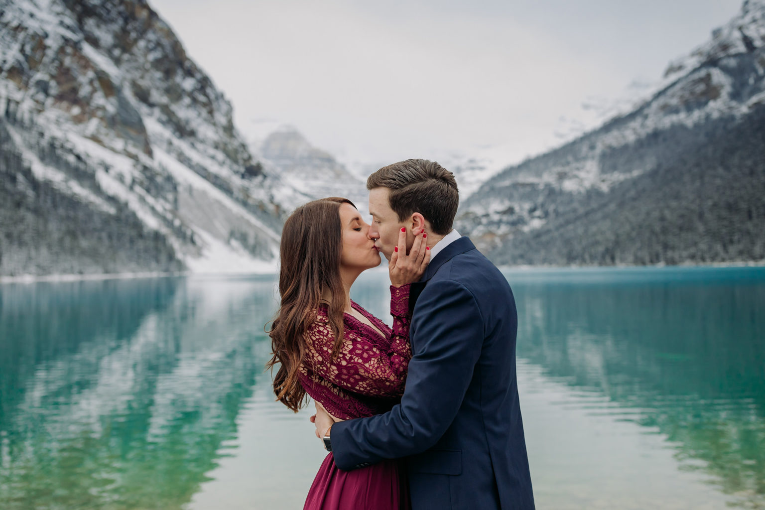 Lake Louise in October: Magical Snowy Mountain Engagement Photos