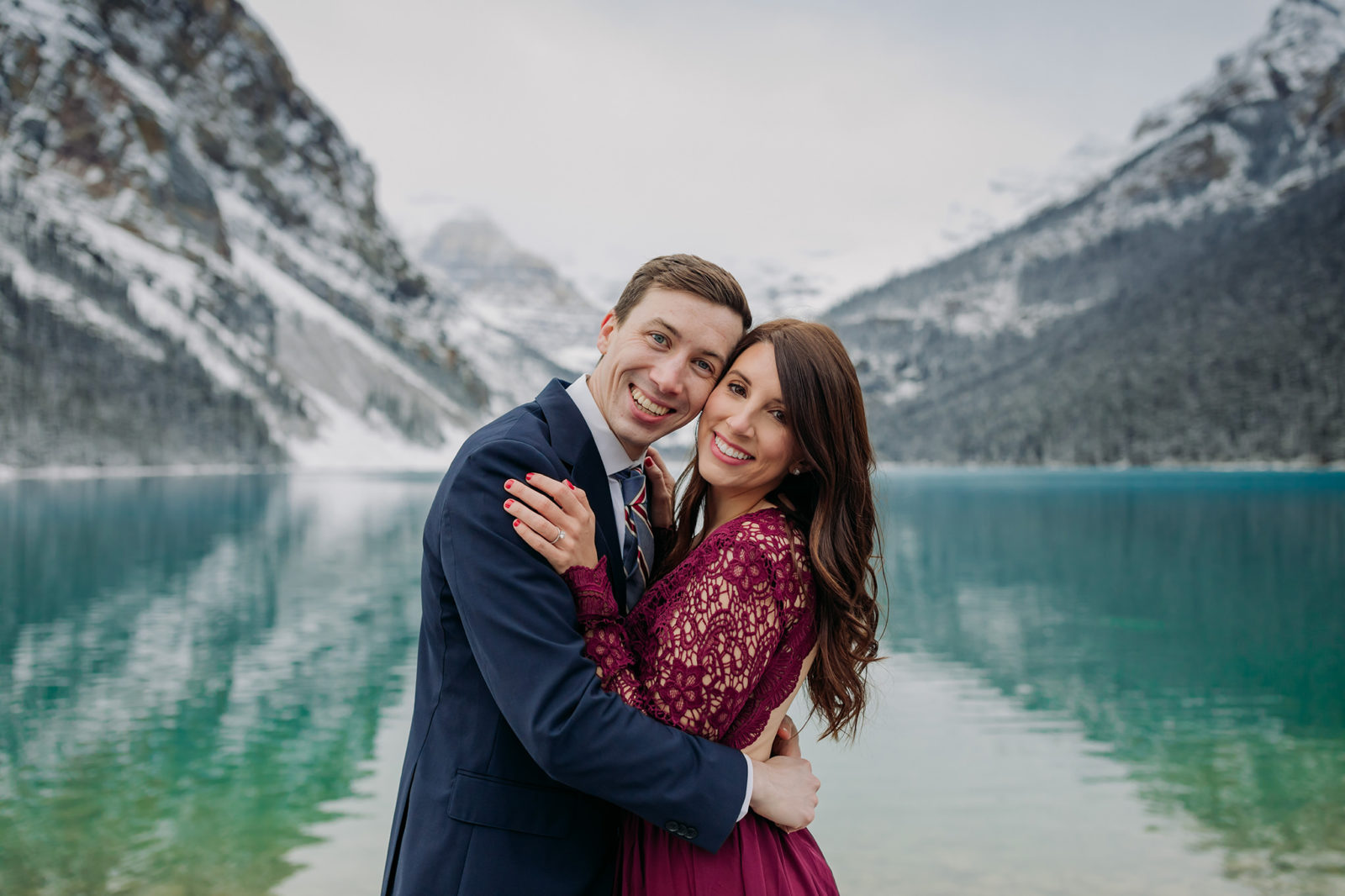 Lake Louise in October: Magical Snowy Mountain Engagement Photos